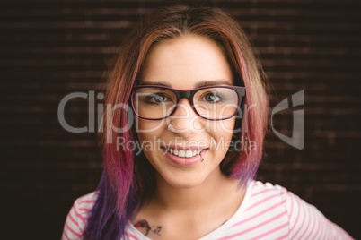 Portrait of smiling woman in spectacles