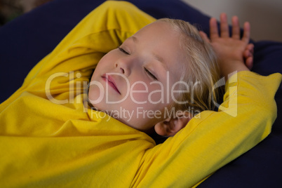 Girl sleeping on examination bed in hospital