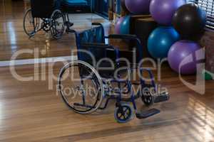 Wheelchair on wooden floor