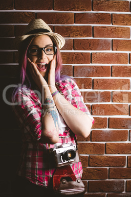 Portrait of shocked woman in spectacles