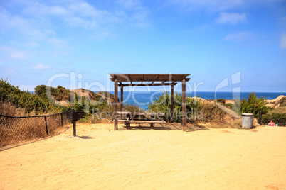 Picnic table and BBQ grill at San Clemente State Beach