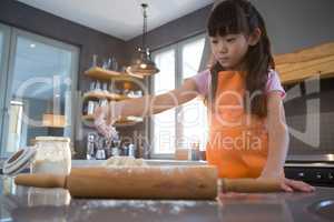 Girl preparing dough