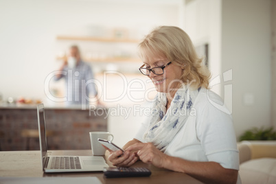 Senior woman using mobile phone