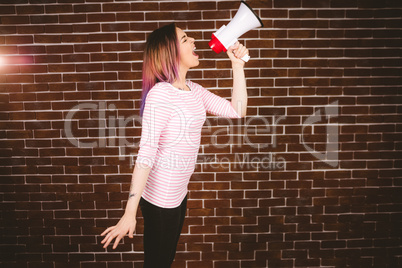 Woman shouting on megaphone