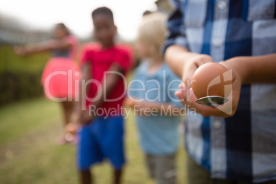 Children playing egg and spoon race