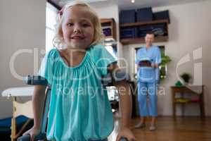 Portrait of smiling girl with crutches