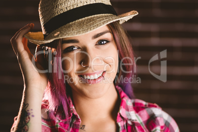 Portrait of smiling woman in hat