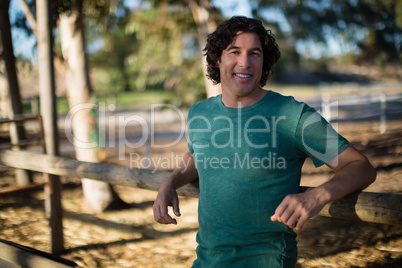 Man smiling at camera in the ranch