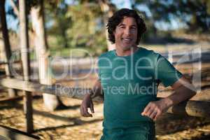 Man smiling at camera in the ranch