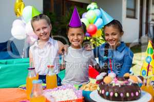 Portrait of children during birthday party