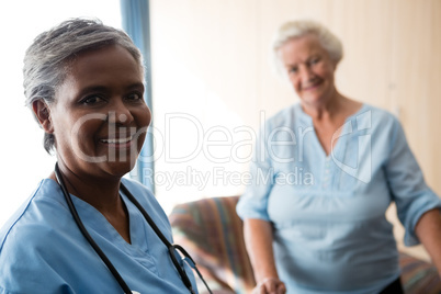 Portrait of nurse and senior patient