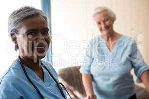 Portrait of nurse and senior patient