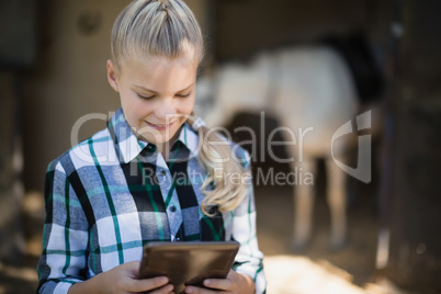Girl using digital tablet