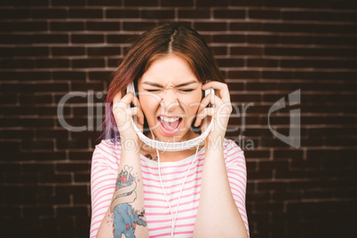 Woman listening music on headphones