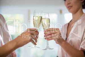 Women toasting a glasses of champagne