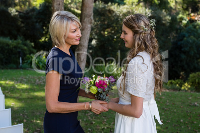 Woman interacting with bride