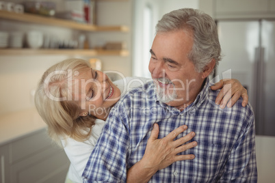 Senior couple hugging each other