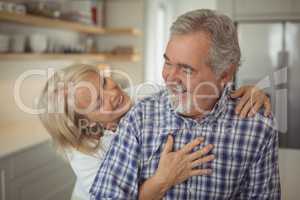 Senior couple hugging each other