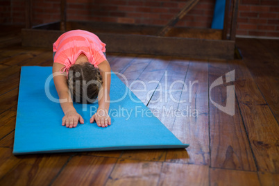 Teenage girl practicing yoga