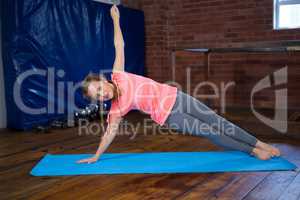 Portrait of teenage girl practicing yoga