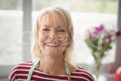 Smiling senior woman looking at camera