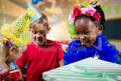 Close up of children with gifts