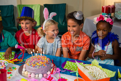 Cheerful children at table