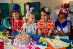 Cheerful children at table