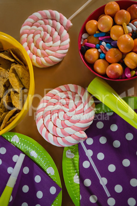 Confectioneries and decorated plates on a table