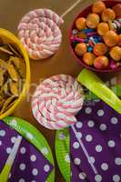 Confectioneries and decorated plates on a table