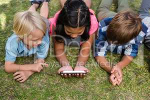 High angle view of children using mobile phone