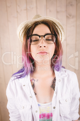 Woman posing with her eyes closed
