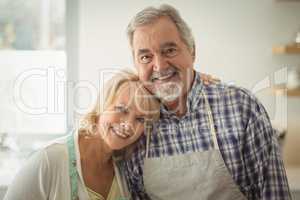 Senior couple hugging each other