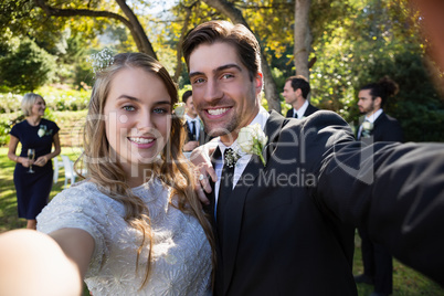 Happy couple posing in park