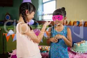 Kids interacting with each other during birthday party