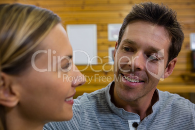 Close up of couple talking in cafe