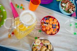 Various confectioneries and juice on a table