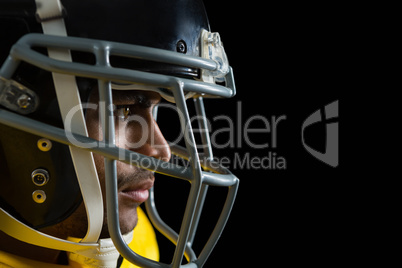 American football player with a head gear