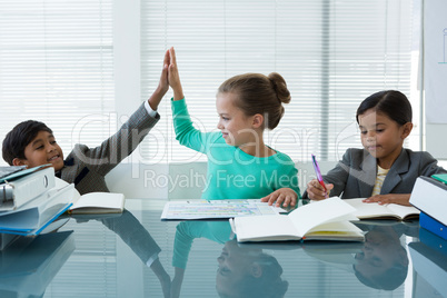 Business people working in boardroom