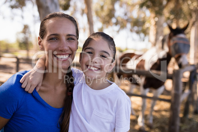 Close up portrait of smiling sisters