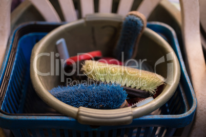 High angle view of brushes in bucket