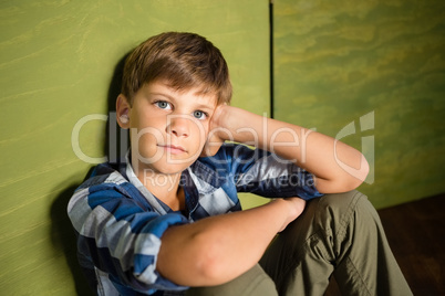 Boy sitting at home