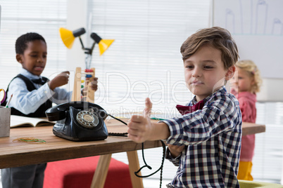 Coworkers working at table in office