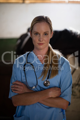 Portrait of female vet with arms crossed