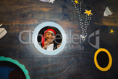 Portrait of boy pretending to be a pirate at home