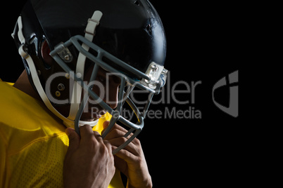 American football player with a head gear