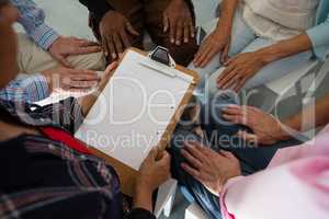 Close up of senior adults siting during discussion