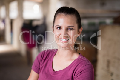 Close up portrait of smiling female jockey