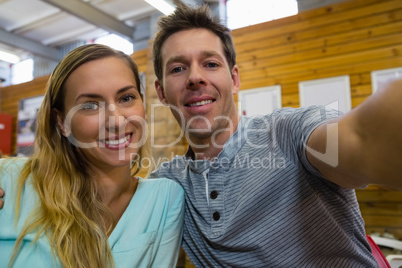 Portrait of couple sitting in cafe