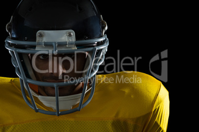 American football player with a head gear